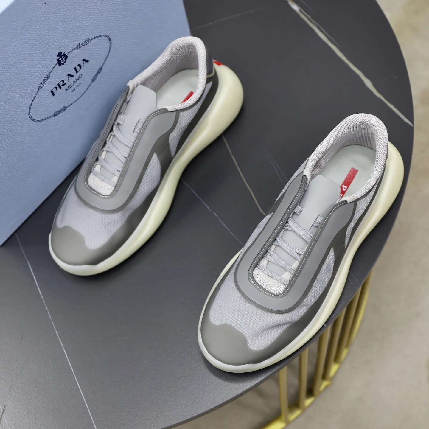 Men's Shoes 💰760💰 PRADA America's Cup Recycled Nylon and Bike Fabric Sneakers Practical and innovative, these regenerated nylon sneakers are modern, with lightweight soles and minimalist details. The upper is decorated with temperature-locking adhesive tape, screen-printed ADA logo, nylon loop shoelaces, T sole, made of ultra-light foam rubber filling material, rubber pattern texture, sole height: 40 mm, removable fabric-covered insole, Size 39-44